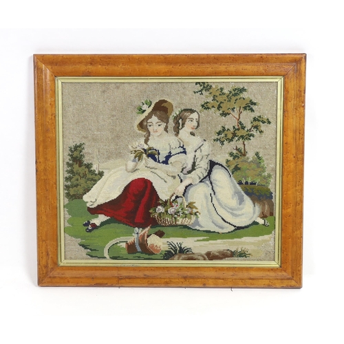 252 - A 19th century maple framed Berlin beadwork embroidery of two young girls, possibly Queen Victorias... 