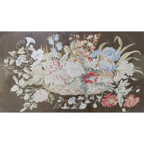 256 - A 19th century framed floral needlework embroidery of a basket of flowers. Worked in multi coloured ... 