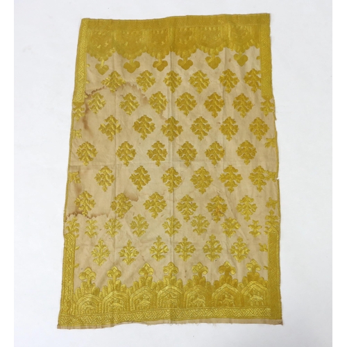 260 - An early 20th century North Indian cotton yellow silk hand embroidered panel, with wide embroidered ... 