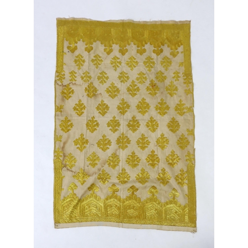 260 - An early 20th century North Indian cotton yellow silk hand embroidered panel, with wide embroidered ... 