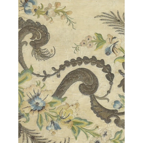 262 - A framed 18th century French silk damask embroidered panel possibly a fragment from Chasuble or simi... 