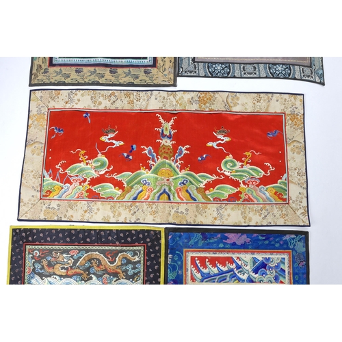 270 - A Chinese late Qing dynasty red silk and polychrome embroidered lishui wave and flaming pearl panel,... 