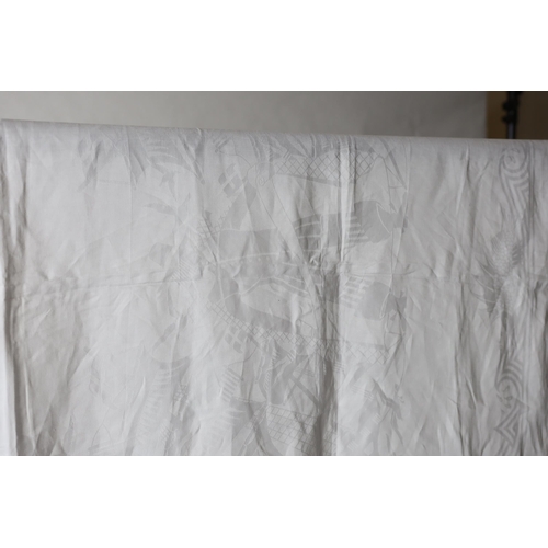 281 - An early 20th century white linen damask table cloth, the design partly inspired by William de Morga... 