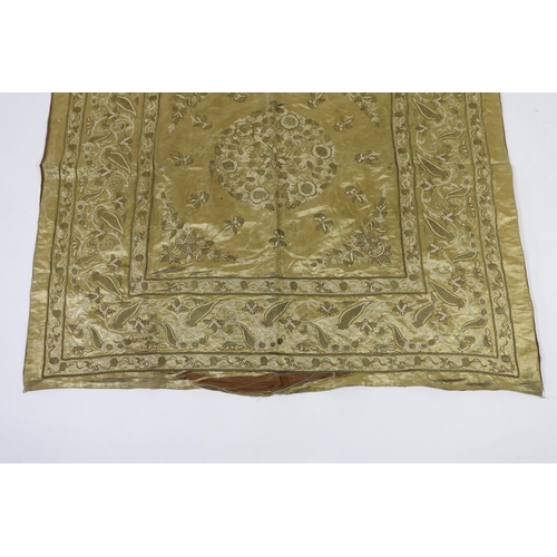 286 - A late 19th century Turkish metallic thread and chain stitch silk satin cover, embroidered with a ce... 