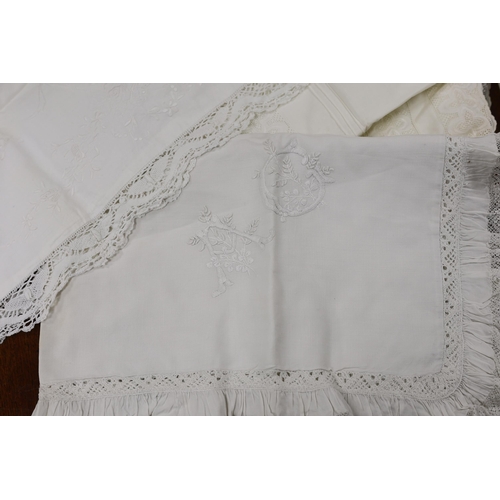 297 - 19th-20th century bed linen; a monogrammed sheet, 7ft 6in., and a smaller crochet edged sheet, a pai... 