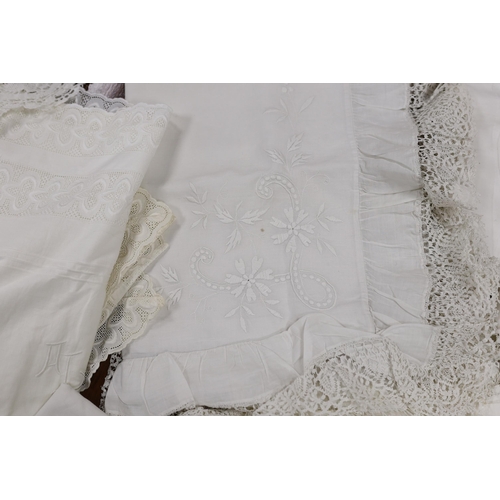 297 - 19th-20th century bed linen; a monogrammed sheet, 7ft 6in., and a smaller crochet edged sheet, a pai... 