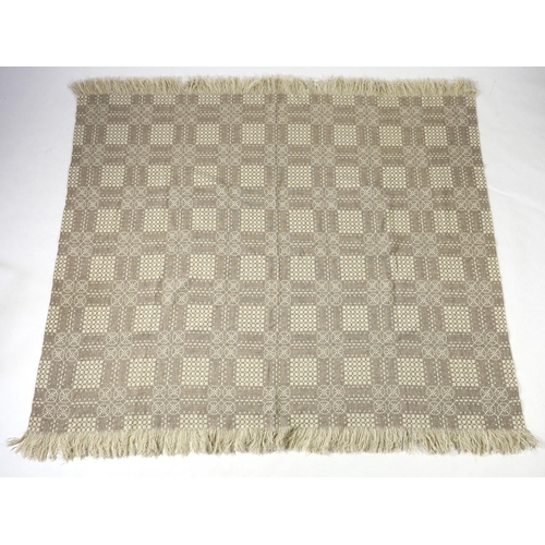 299 - A Welsh wool woven blanket, using mushroom and cream wool in a reversible geometric design, 192cm wi... 