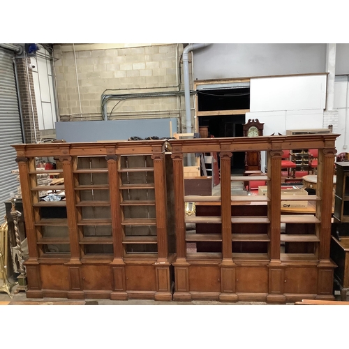 3 - A pair of mid 20th century Sheraton style pitch pine and ply open bookcases, the adjustable shelves ... 