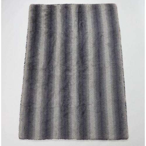 301 - An unusual Motolux vintage car motoring rug, originally made in the 1930s-40s from Alpaca wool, re... 