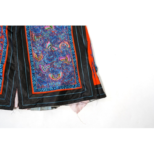 303 - A late 19th century Chinese embroidered skirt, now made into a tunic