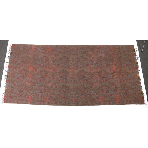 308 - An 1860s-70s Scottish Paisley wool shawl, woven with multi coloured wools in a large scrolling tea... 