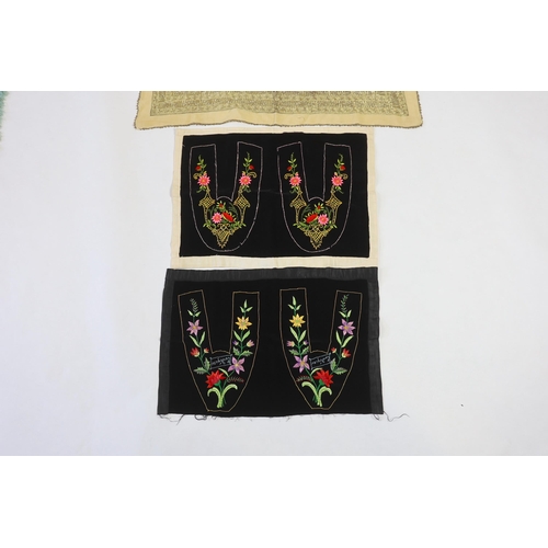 312 - Two pairs of late 19th century black velvet silk embroidered slipper fronts (uncut), together with a... 