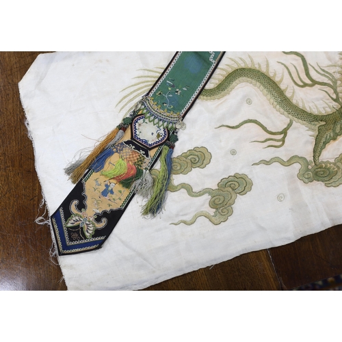 313 - A collection of Chinese embroideries, to include a pair of tasselled embroidered panels to a wedding... 