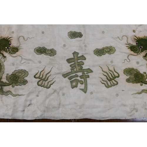 313 - A collection of Chinese embroideries, to include a pair of tasselled embroidered panels to a wedding... 