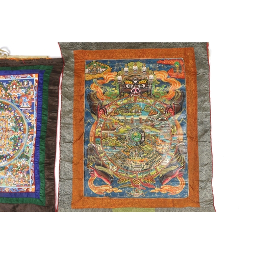 319 - Two Tibetan 20th century Nepalese Thangka and a Burmese Sutra, one Thangka depicting six sections of... 