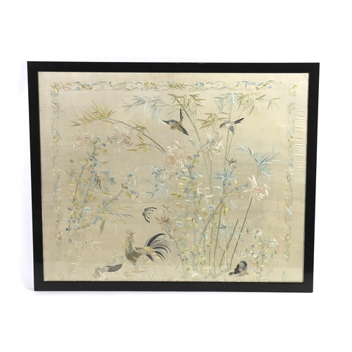 320 - A framed early 20th century Chinese silk embroidered shawl, embroidered with chickens, ducks, flying... 