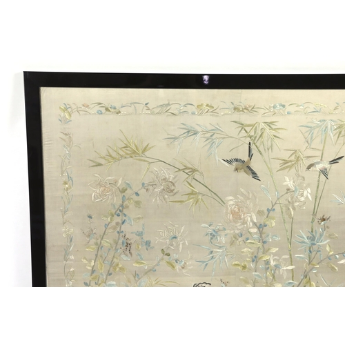 320 - A framed early 20th century Chinese silk embroidered shawl, embroidered with chickens, ducks, flying... 