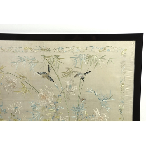 320 - A framed early 20th century Chinese silk embroidered shawl, embroidered with chickens, ducks, flying... 