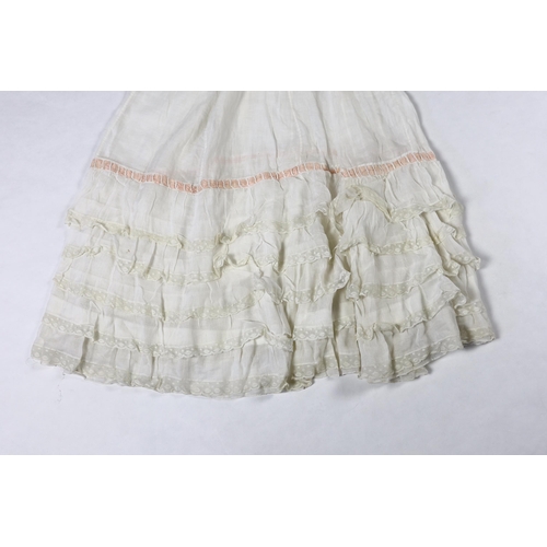 328 - Three Victorian white worked petticoats; one two tiered, one lace trimmed with ribboning, the third ... 