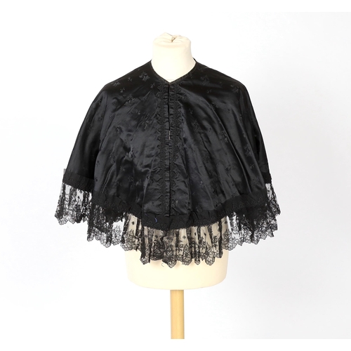 329 - Two ladies Victorian black satin and lace, bead trimmed bodices, together with a black lace cape, a ... 