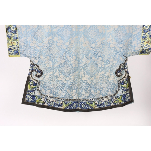 331 - A late 19th / early 20th century silk damask robe, edged with highly ornate embroidered silk braidin... 