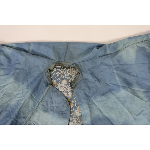 331 - A late 19th / early 20th century silk damask robe, edged with highly ornate embroidered silk braidin... 