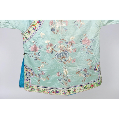 332 - An early 20th century Chinese silk embroidered turquoise robe, embroidered in pastel silk with butte... 