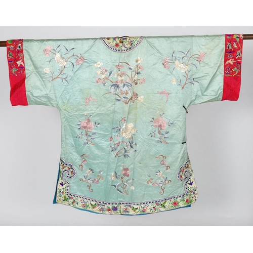 332 - An early 20th century Chinese silk embroidered turquoise robe, embroidered in pastel silk with butte... 