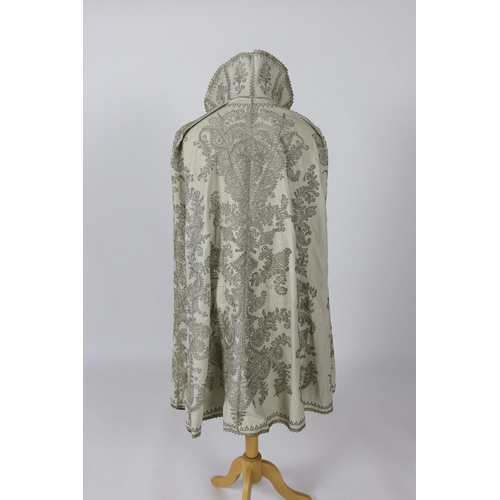 337 - A 19th century Indian fine cream wool embroidered cape, probably made for the European market, embro... 