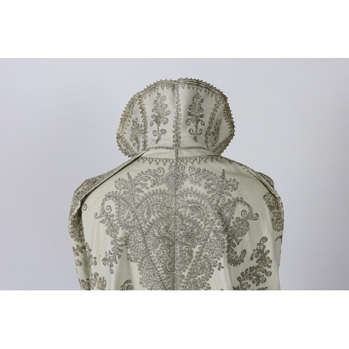 337 - A 19th century Indian fine cream wool embroidered cape, probably made for the European market, embro... 