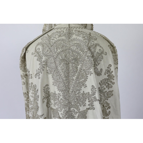 337 - A 19th century Indian fine cream wool embroidered cape, probably made for the European market, embro... 