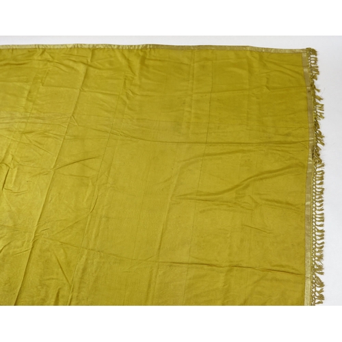 343 - A large Regency yellow silk curtain, with fringed base, French short loom ribbed silk panels made in... 