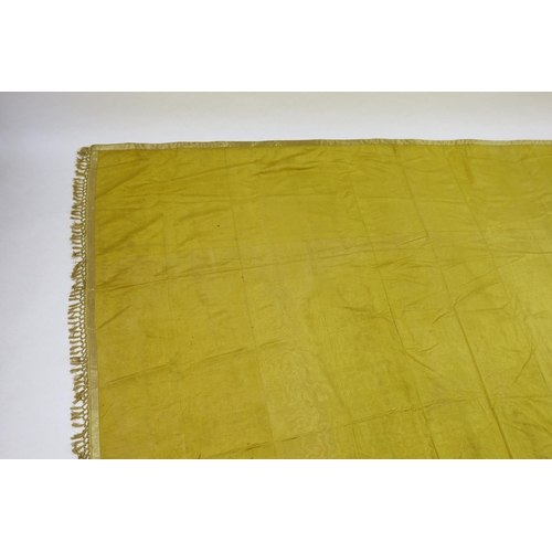 343 - A large Regency yellow silk curtain, with fringed base, French short loom ribbed silk panels made in... 