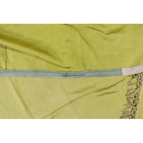 343 - A large Regency yellow silk curtain, with fringed base, French short loom ribbed silk panels made in... 