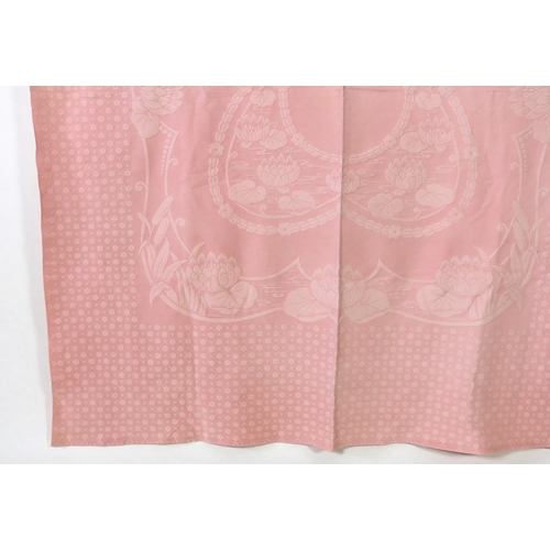 345 - An early 20th century pink lily pad and bull rush designed woven Marcella bedspread, 192cm wide, 2... 