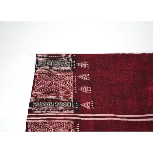 349 - A Tunisian Amazigh, Berber maroon and white woven wool wall hanging, possibly  107 x 125cm