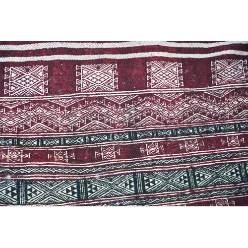 349 - A Tunisian Amazigh, Berber maroon and white woven wool wall hanging, possibly  107 x 125cm