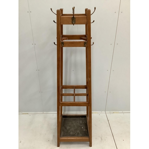 35 - An early 20th century mahogany coat and stick stand, height 186cm