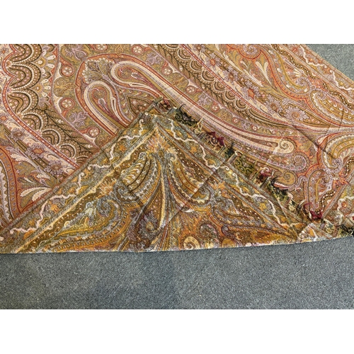 353 - A 19th century woven Scottish Paisley wool shawl, bordered on four sides and fringed on two, woven w... 