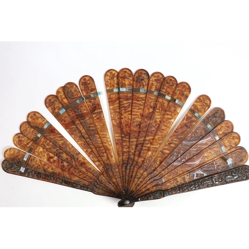 361 - A 19th century Chinese finely carved tortoiseshell brisé fan, 18cm high