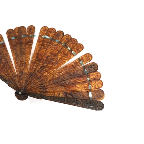 361 - A 19th century Chinese finely carved tortoiseshell brisé fan, 18cm high