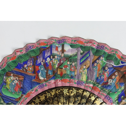 364 - A 19th century Chinese ornately lacquered and hand painted figural leaf fan, the figures on the leaf... 