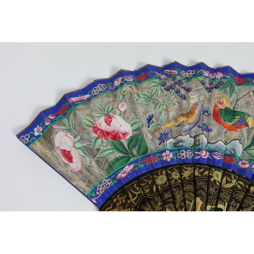 364 - A 19th century Chinese ornately lacquered and hand painted figural leaf fan, the figures on the leaf... 