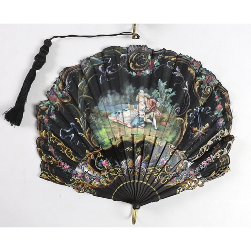 367 - A late 19th century hand painted shaped and carved figurative fan, signed, together with a lacquer a... 