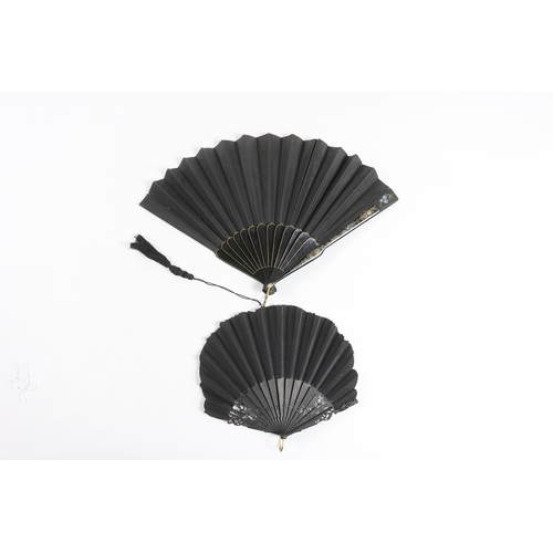 367 - A late 19th century hand painted shaped and carved figurative fan, signed, together with a lacquer a... 