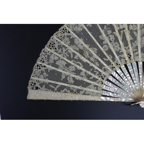 369 - An unusual commemorative Carrickmacross lace fan, possibly one made and entered for a group of compe... 