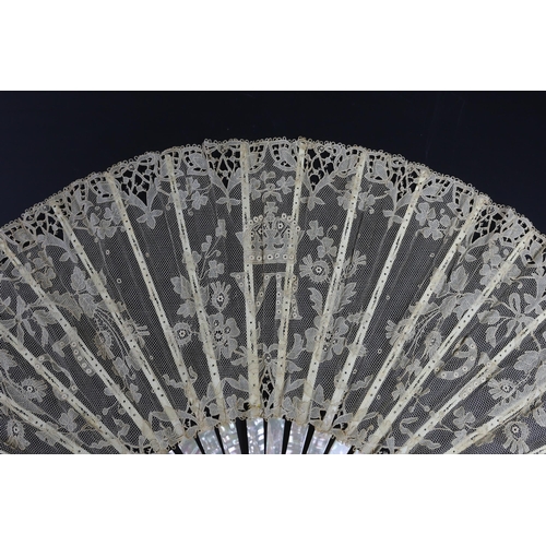 369 - An unusual commemorative Carrickmacross lace fan, possibly one made and entered for a group of compe... 