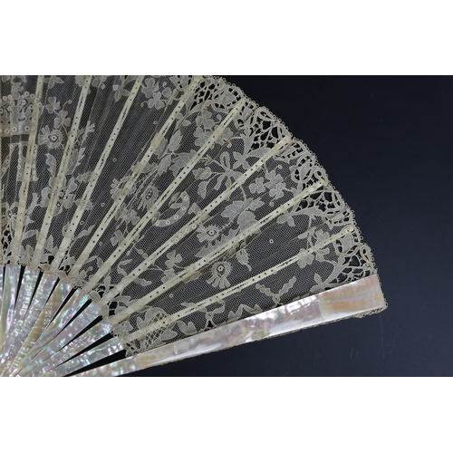 369 - An unusual commemorative Carrickmacross lace fan, possibly one made and entered for a group of compe... 