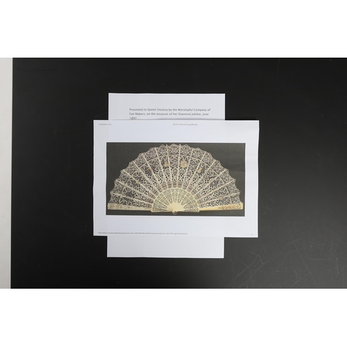 369 - An unusual commemorative Carrickmacross lace fan, possibly one made and entered for a group of compe... 