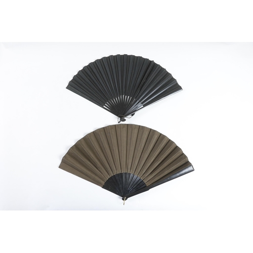 373 - Two early 20th century ebony fans, one cotton leaf, the other hand painted pansies on a fine a silk ... 